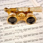 pearl and gold opera glasses on sheet music